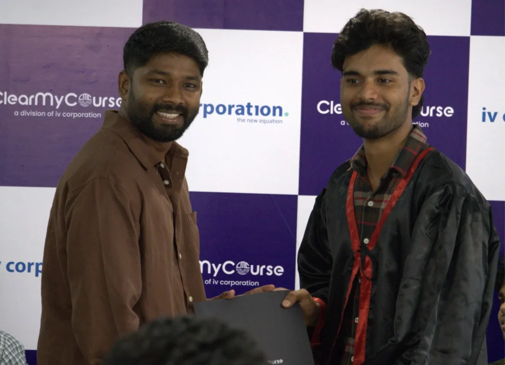Clear My Course Convocation 2026: Celebrating Kochi's Newest Digital Marketing Graduates 3 The image shows Jijo Joseph handing over the certificate to Jibin.