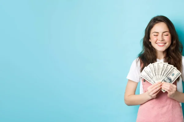 portrait-young-woman-standing-against-blue-background-1-66d56c3f67a52